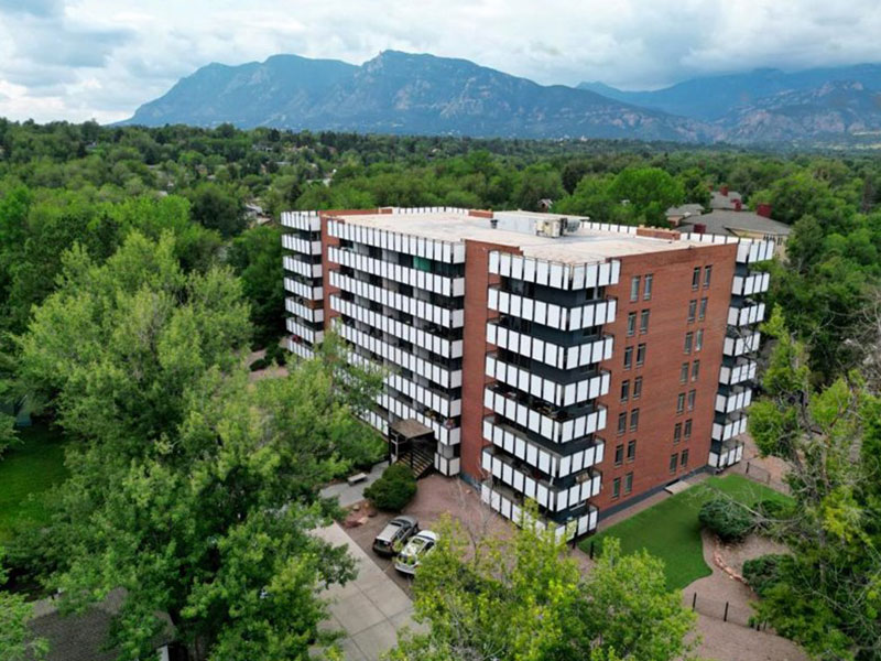 Luxe Tower with mountains in background